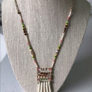 Womens crystal beaded and bone embellishment necklace.